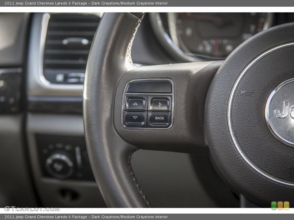Dark Graystone/Medium Graystone Interior Controls for the 2011 Jeep Grand Cherokee Laredo X Package #89522071