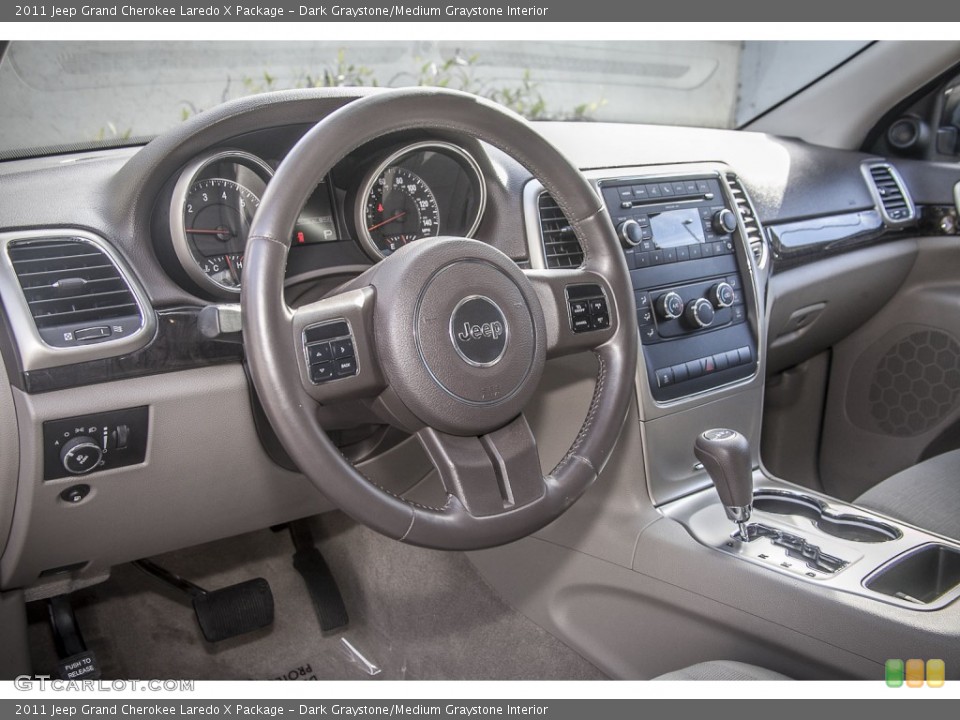 Dark Graystone/Medium Graystone Interior Dashboard for the 2011 Jeep Grand Cherokee Laredo X Package #89522111