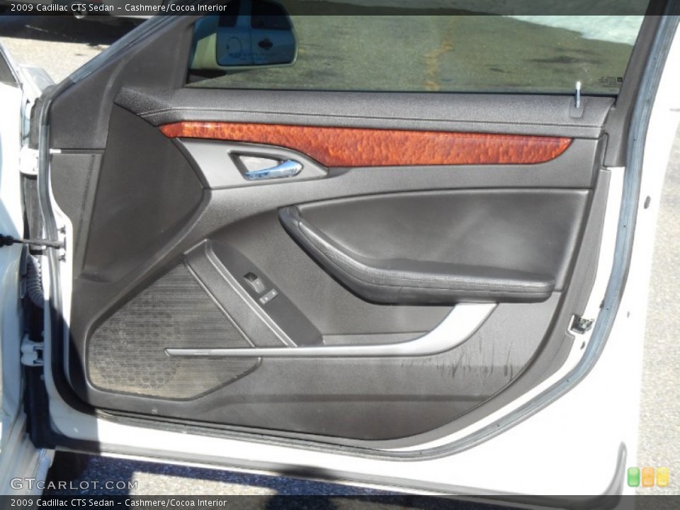 Cashmere/Cocoa Interior Door Panel for the 2009 Cadillac CTS Sedan #89546452