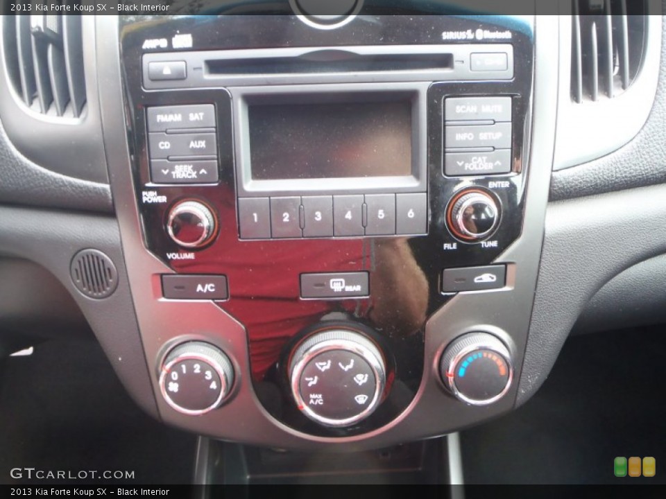 Black Interior Controls for the 2013 Kia Forte Koup SX #89569757