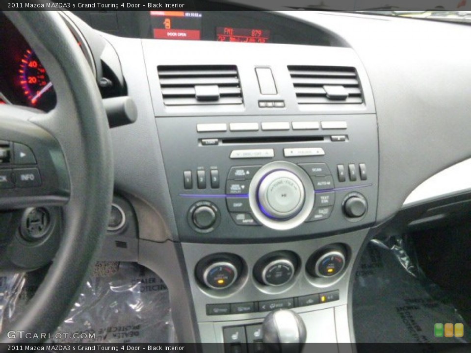 Black Interior Controls for the 2011 Mazda MAZDA3 s Grand Touring 4 Door #89605493