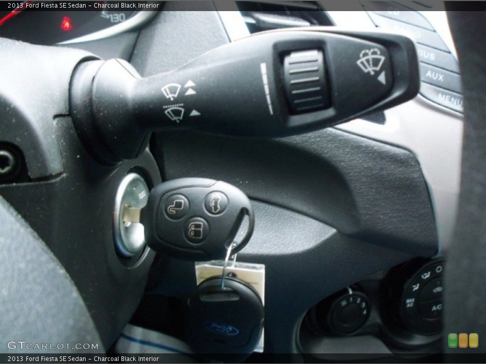 Charcoal Black Interior Controls for the 2013 Ford Fiesta SE Sedan #89610227