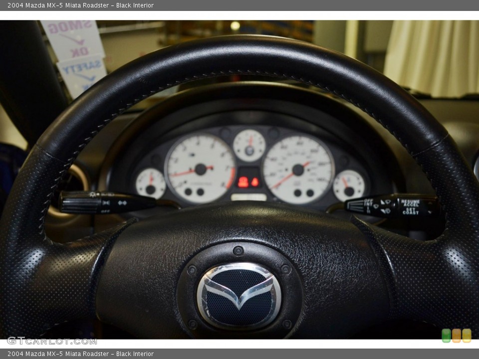 Black Interior Steering Wheel for the 2004 Mazda MX-5 Miata Roadster #89641803