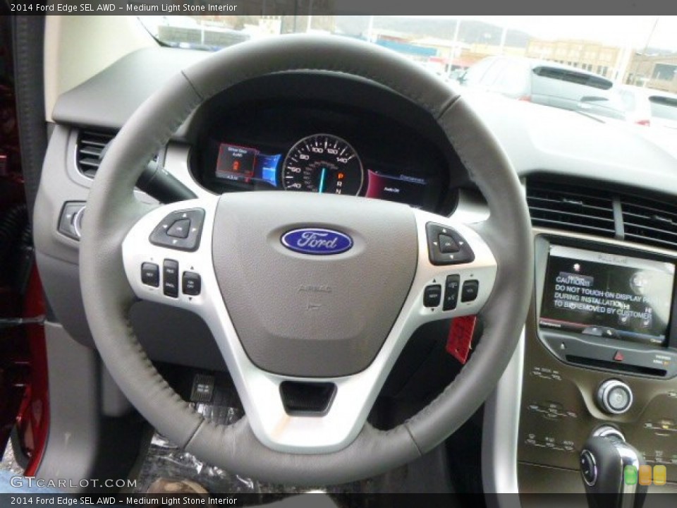 Medium Light Stone Interior Steering Wheel for the 2014 Ford Edge SEL AWD #89646519