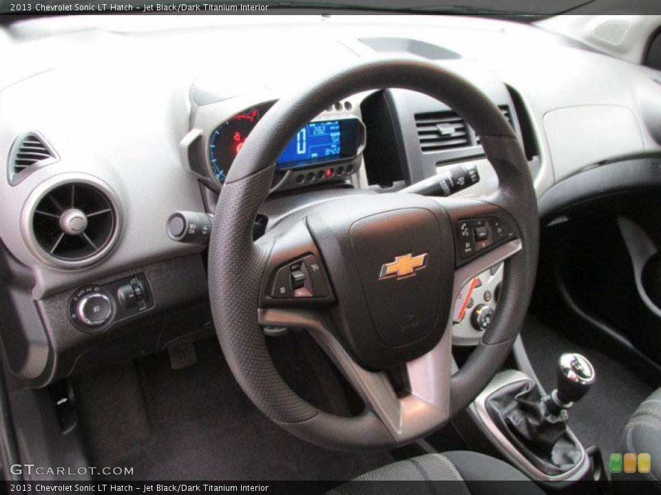 Jet Black/Dark Titanium Interior Steering Wheel for the 2013 Chevrolet Sonic LT Hatch #89657241