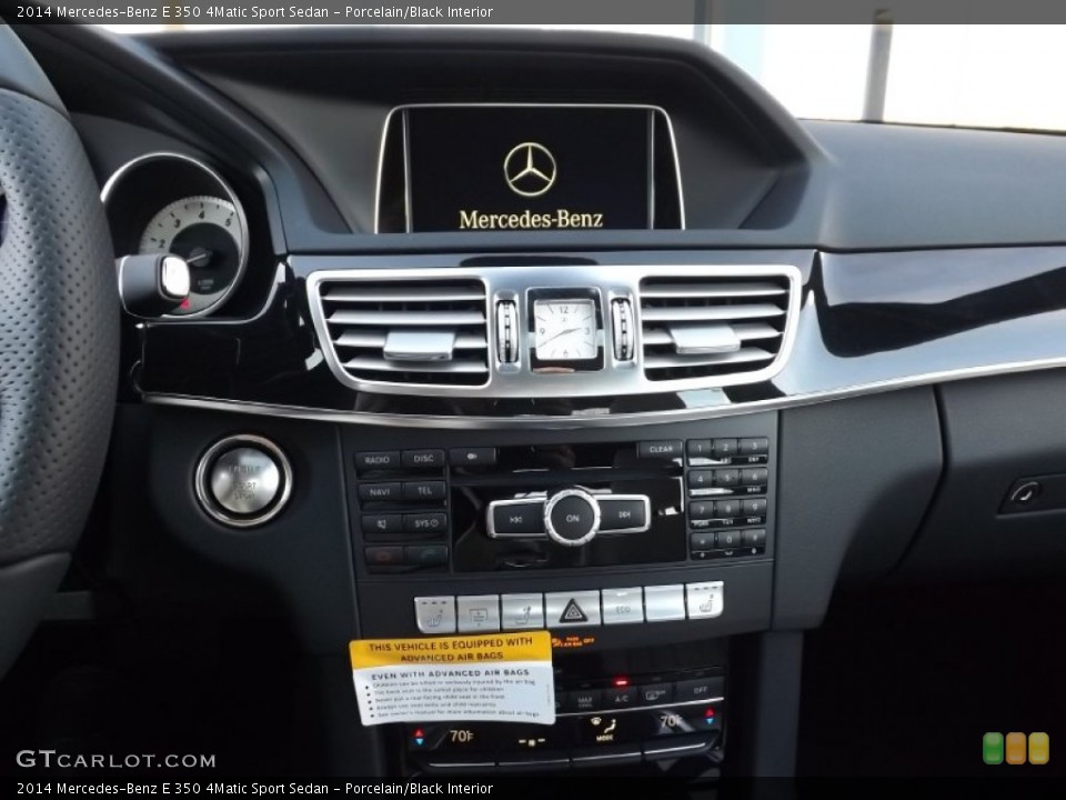 Porcelain/Black Interior Controls for the 2014 Mercedes-Benz E 350 4Matic Sport Sedan #89665788