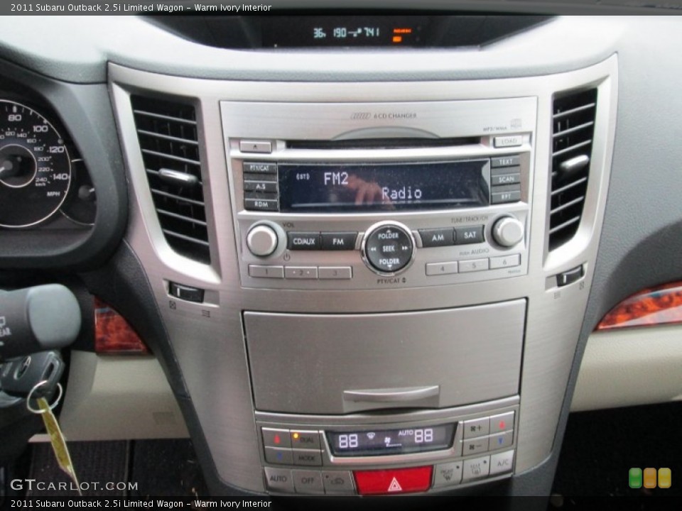 Warm Ivory Interior Controls for the 2011 Subaru Outback 2.5i Limited Wagon #89810809