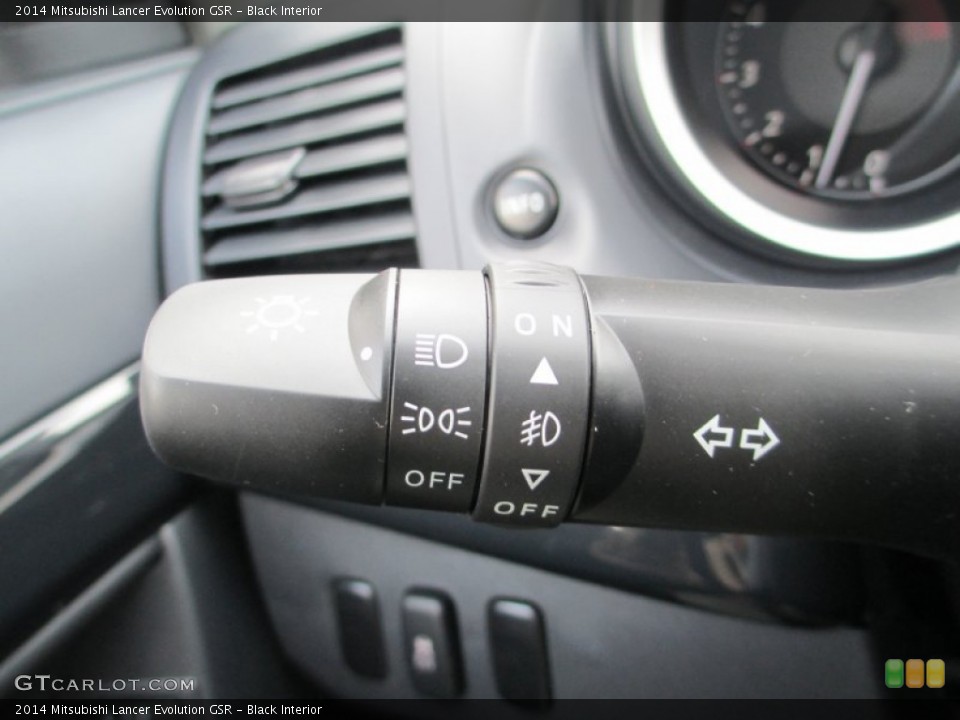Black Interior Controls for the 2014 Mitsubishi Lancer Evolution GSR #89836592
