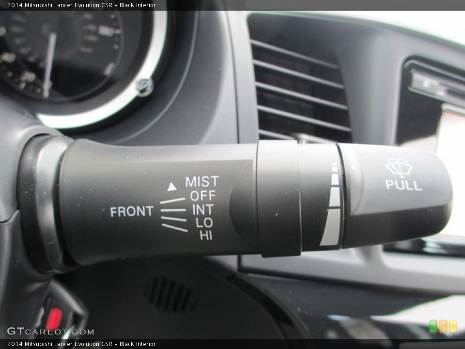 Black Interior Controls for the 2014 Mitsubishi Lancer Evolution GSR #89836616