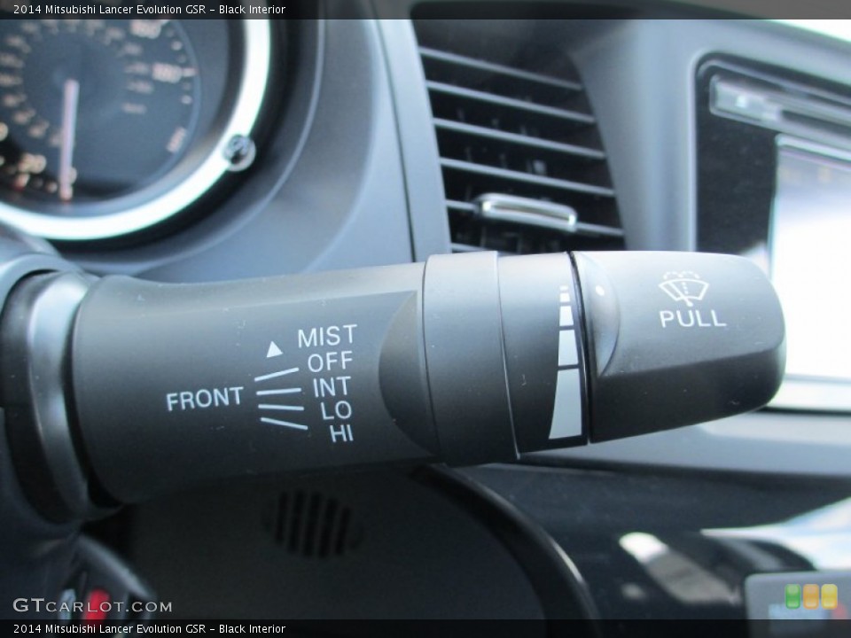 Black Interior Controls for the 2014 Mitsubishi Lancer Evolution GSR #89837369