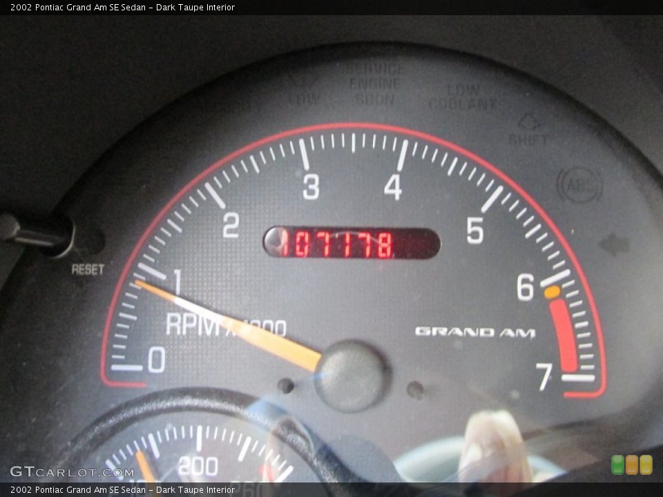 Dark Taupe Interior Gauges for the 2002 Pontiac Grand Am SE Sedan #89872738