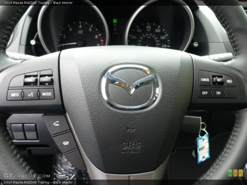 Black Interior Controls for the 2014 Mazda MAZDA5 Touring #89875102