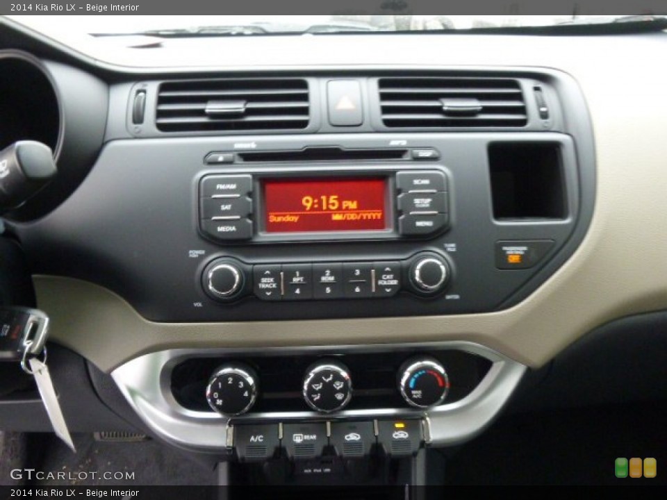 Beige Interior Controls for the 2014 Kia Rio LX #89889559