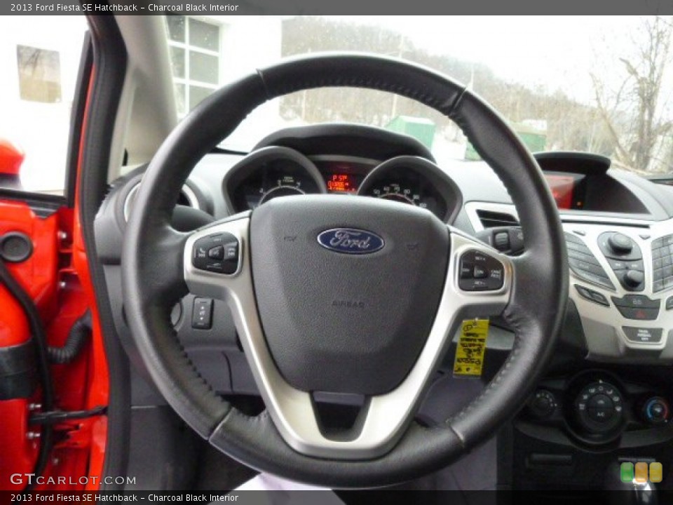 Charcoal Black Interior Steering Wheel for the 2013 Ford Fiesta SE Hatchback #89892895