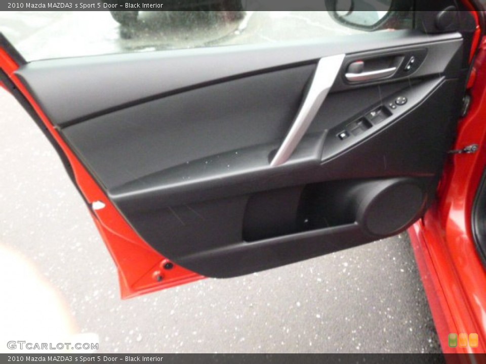 Black Interior Door Panel for the 2010 Mazda MAZDA3 s Sport 5 Door #89893654