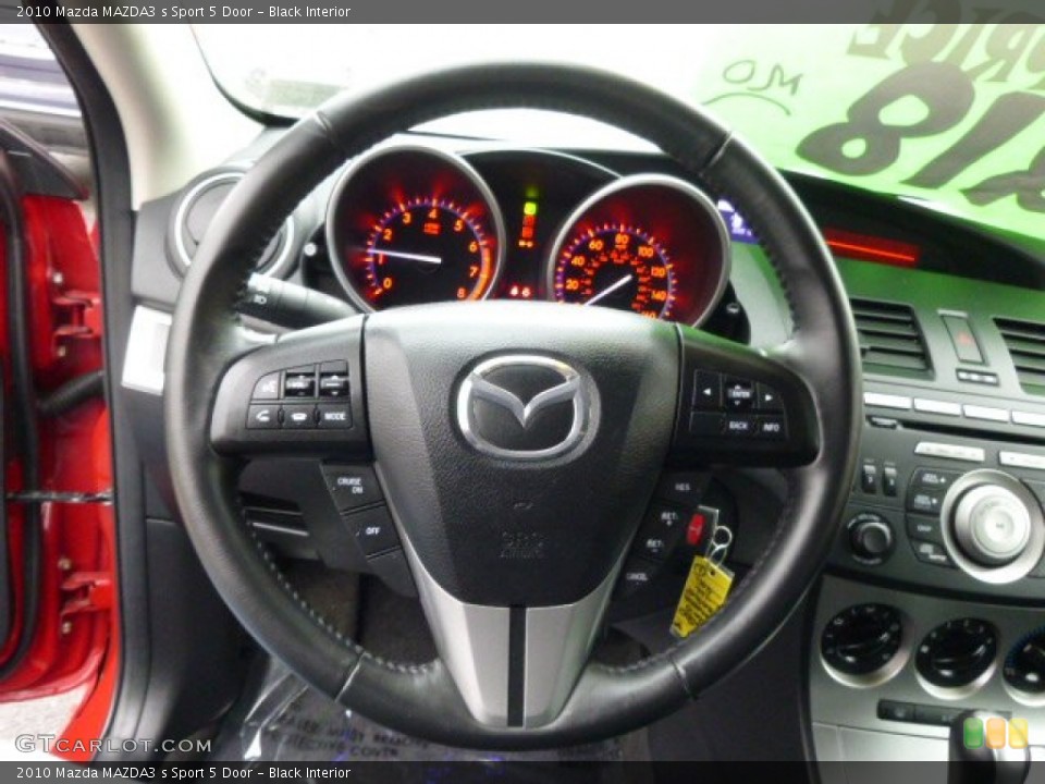 Black Interior Steering Wheel for the 2010 Mazda MAZDA3 s Sport 5 Door #89893807