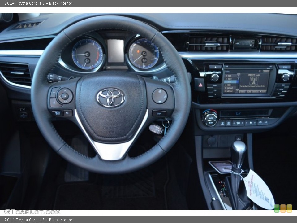 Black Interior Steering Wheel for the 2014 Toyota Corolla S #89897458