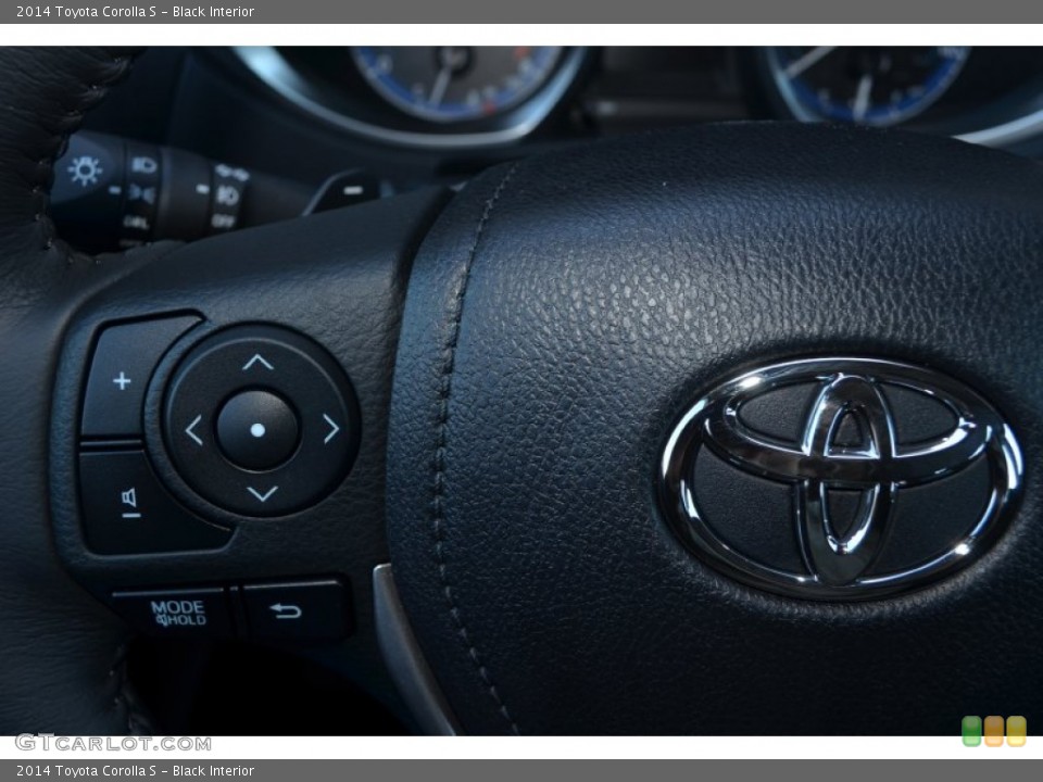 Black Interior Controls for the 2014 Toyota Corolla S #89897623