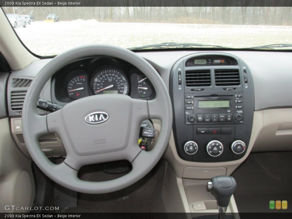 Beige Interior Dashboard for the 2009 Kia Spectra EX Sedan #89903719