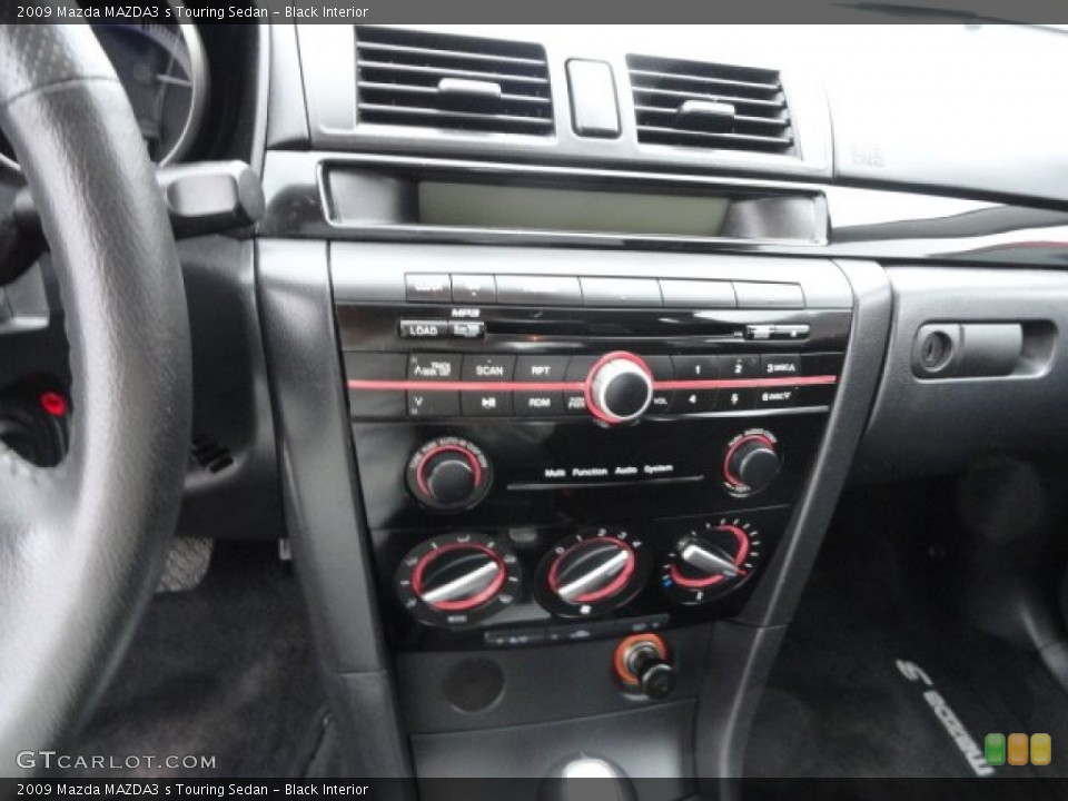 Black Interior Controls for the 2009 Mazda MAZDA3 s Touring Sedan #89905615