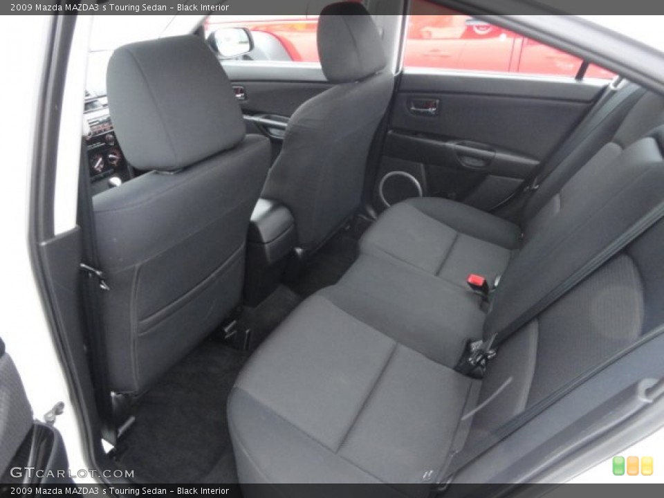 Black Interior Rear Seat for the 2009 Mazda MAZDA3 s Touring Sedan #89905636