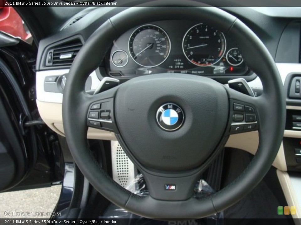 Oyster/Black Interior Steering Wheel for the 2011 BMW 5 Series 550i xDrive Sedan #89909815