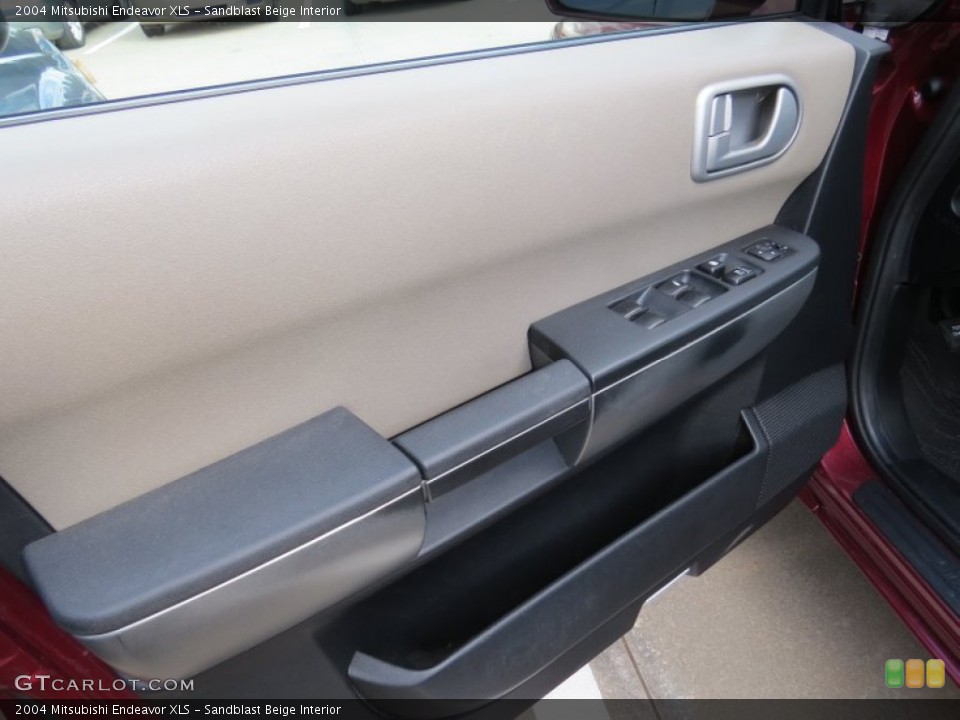 Sandblast Beige Interior Door Panel for the 2004 Mitsubishi Endeavor XLS #89938383