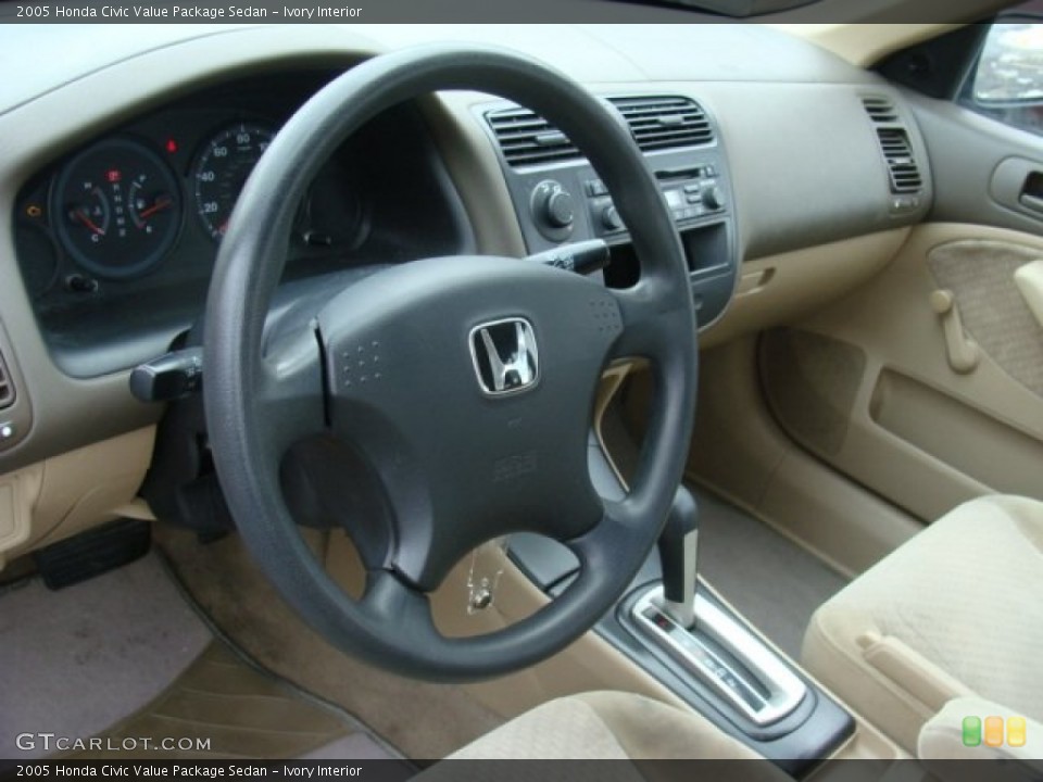 Ivory Interior Prime Interior for the 2005 Honda Civic Value Package Sedan #90078657
