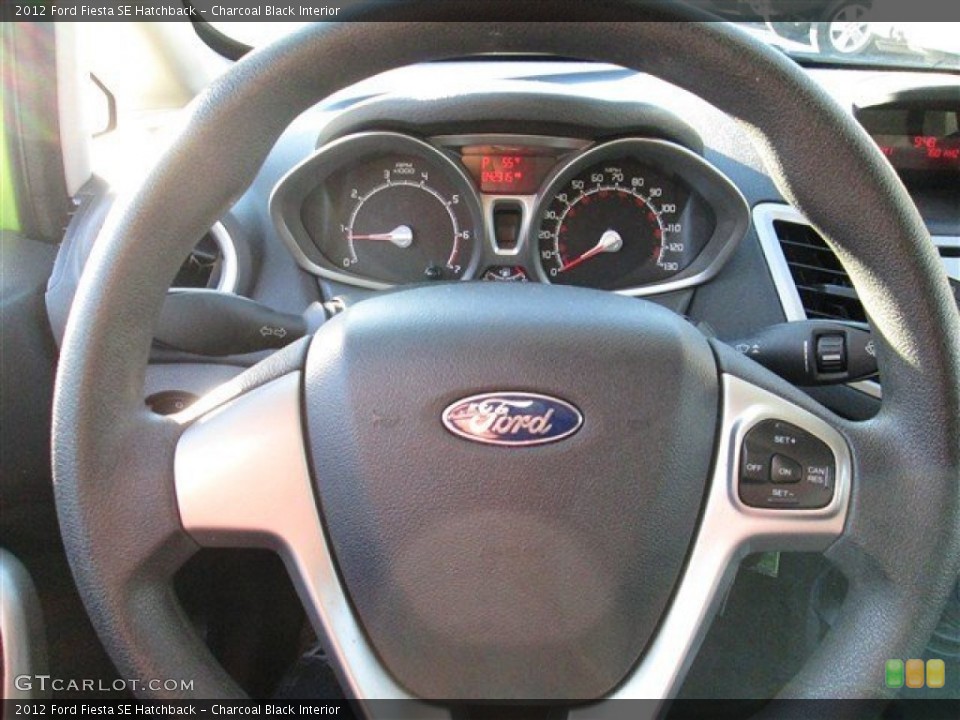 Charcoal Black Interior Steering Wheel for the 2012 Ford Fiesta SE Hatchback #90104445