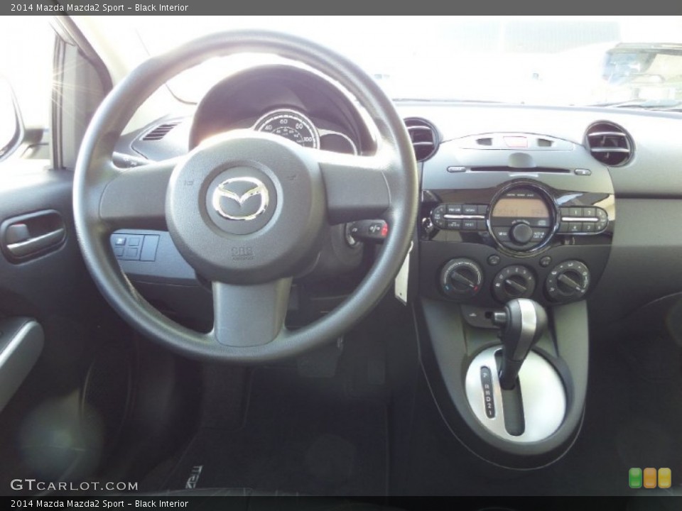 Black Interior Dashboard for the 2014 Mazda Mazda2 Sport #90123535
