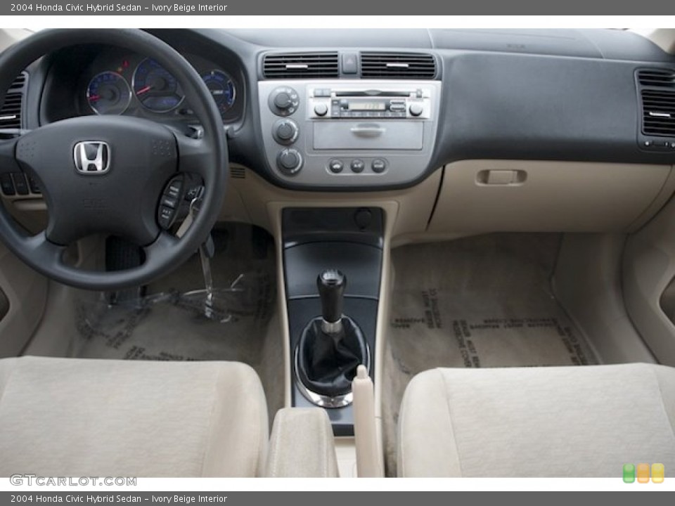 Ivory Beige Interior Dashboard for the 2004 Honda Civic Hybrid Sedan #90133087