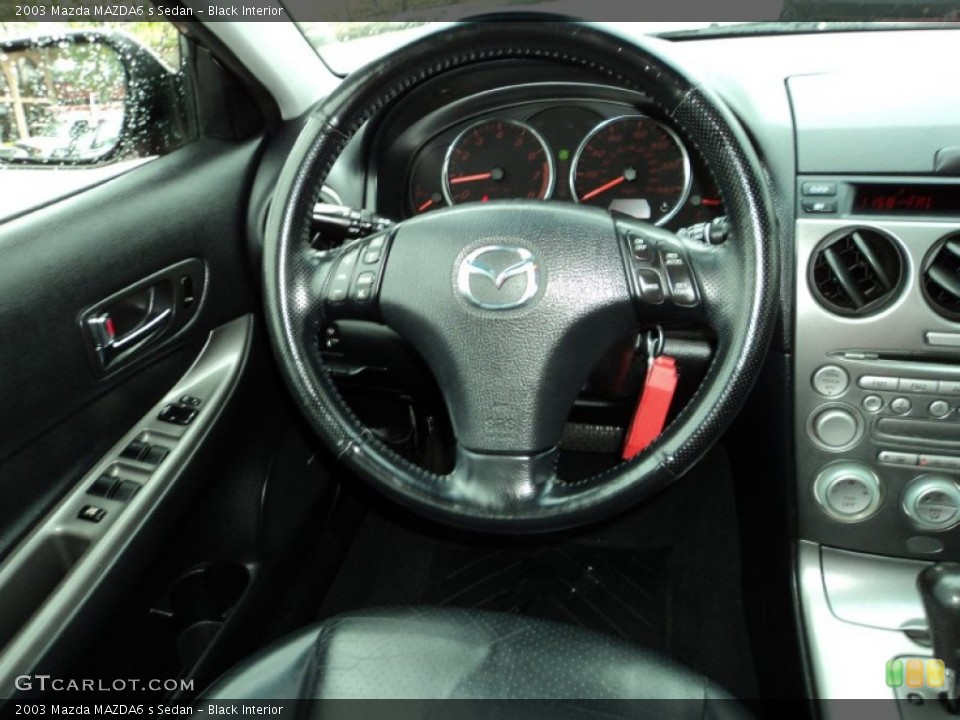 Black Interior Steering Wheel for the 2003 Mazda MAZDA6 s Sedan #90192329