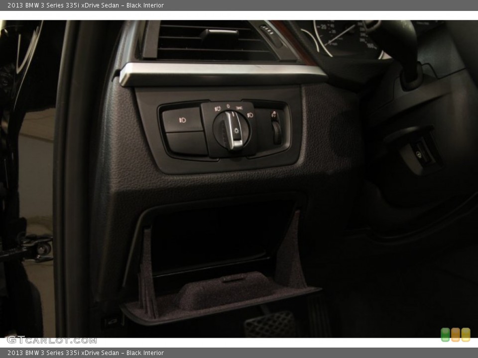Black Interior Controls for the 2013 BMW 3 Series 335i xDrive Sedan #90203542