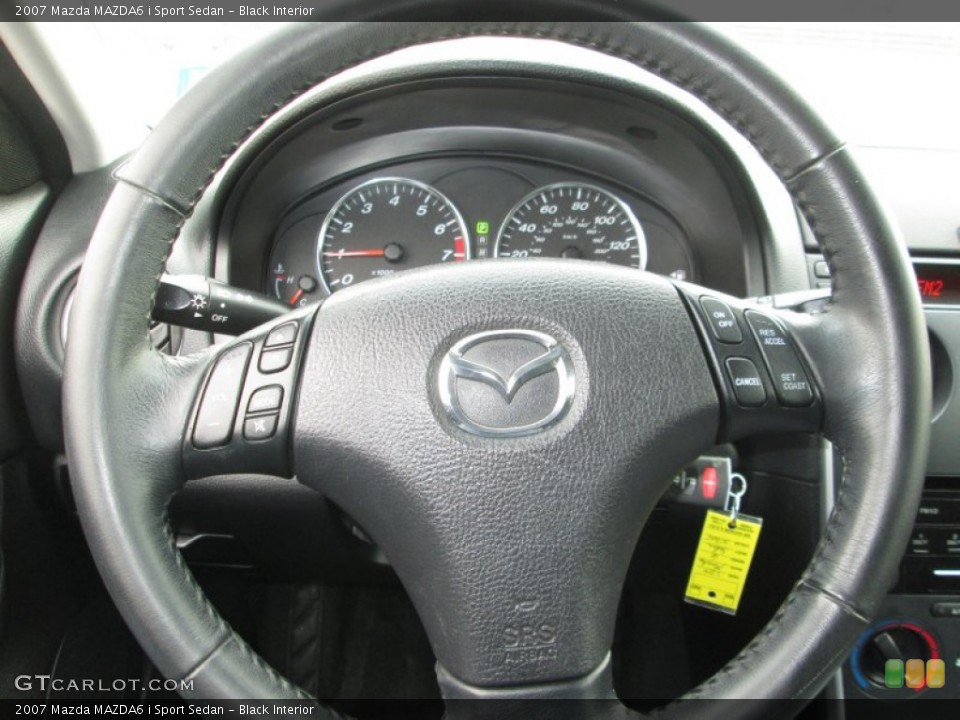 Black Interior Steering Wheel for the 2007 Mazda MAZDA6 i Sport Sedan #90205496