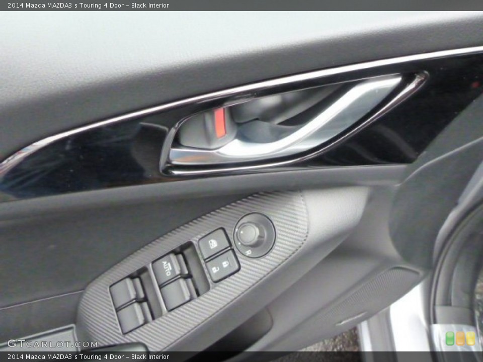 Black Interior Controls for the 2014 Mazda MAZDA3 s Touring 4 Door #90272564