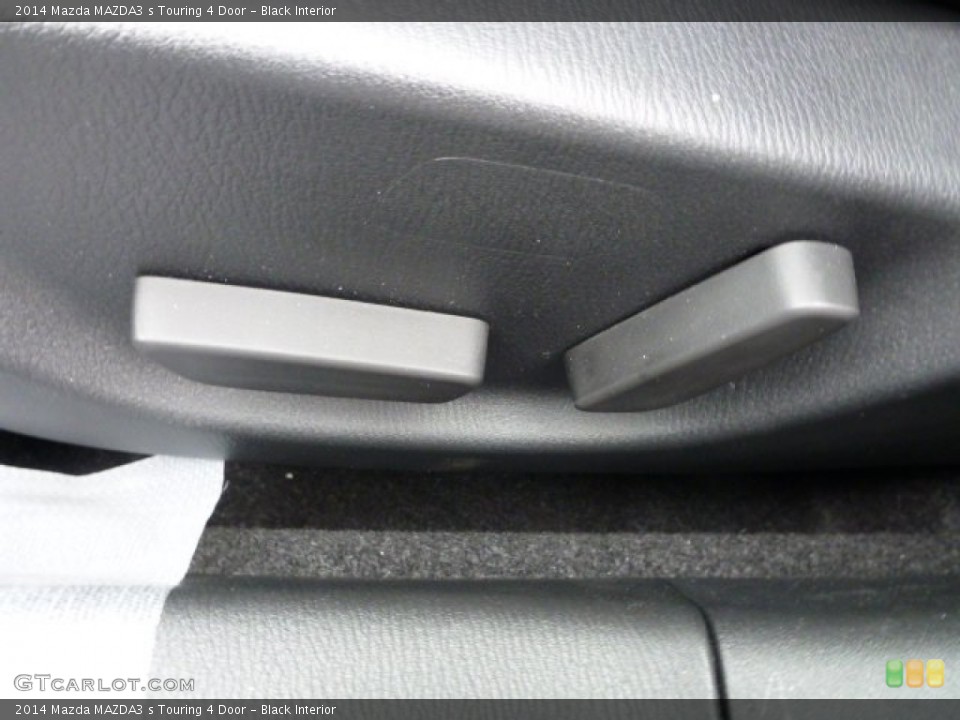 Black Interior Controls for the 2014 Mazda MAZDA3 s Touring 4 Door #90272591