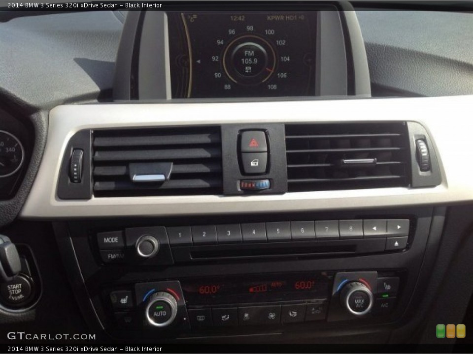 Black Interior Controls for the 2014 BMW 3 Series 320i xDrive Sedan #90292138