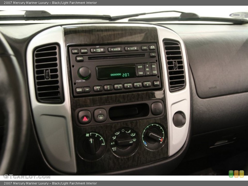 Black/Light Parchment Interior Controls for the 2007 Mercury Mariner Luxury #90345926