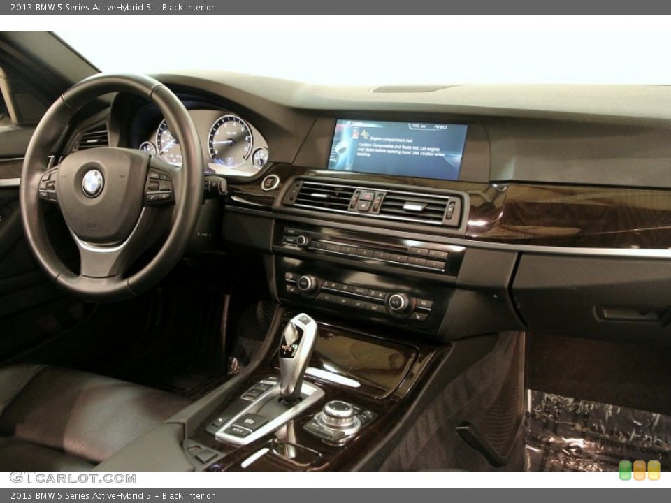Black Interior Dashboard for the 2013 BMW 5 Series ActiveHybrid 5 #90347424