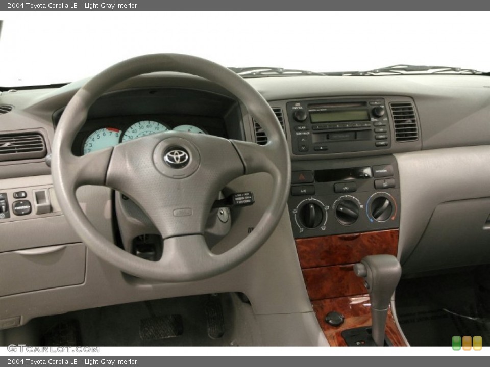Light Gray Interior Dashboard for the 2004 Toyota Corolla LE #90349242