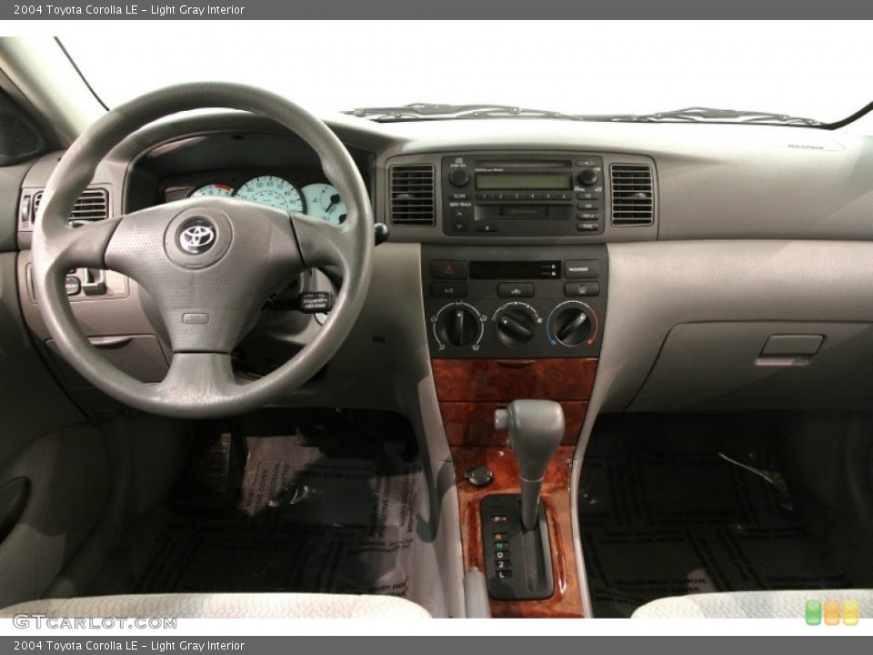 Light Gray Interior Dashboard for the 2004 Toyota Corolla LE #90349536