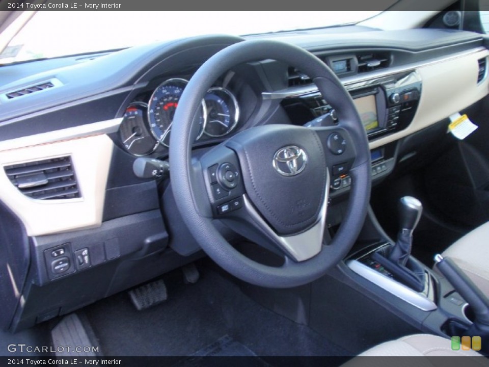 Ivory Interior Dashboard for the 2014 Toyota Corolla LE #90358636