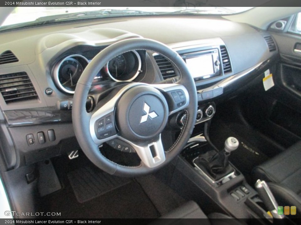 Black Interior Dashboard for the 2014 Mitsubishi Lancer Evolution GSR #90407389
