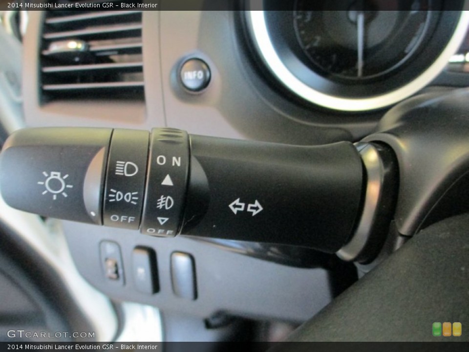 Black Interior Controls for the 2014 Mitsubishi Lancer Evolution GSR #90407405