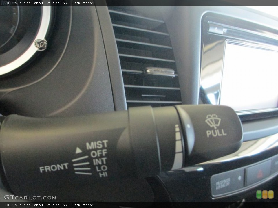 Black Interior Controls for the 2014 Mitsubishi Lancer Evolution GSR #90407411