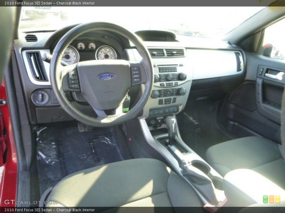 Charcoal Black Interior Prime Interior for the 2010 Ford Focus SES Sedan #90441831
