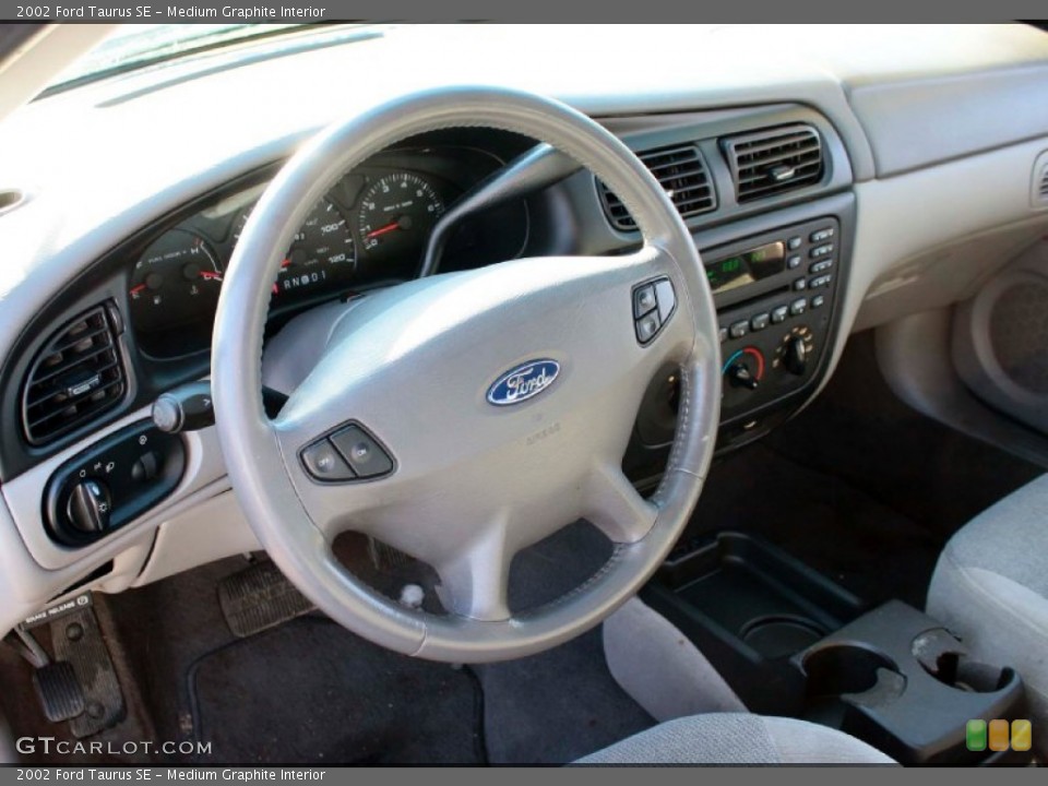 Medium Graphite Interior Dashboard for the 2002 Ford Taurus SE #90486653