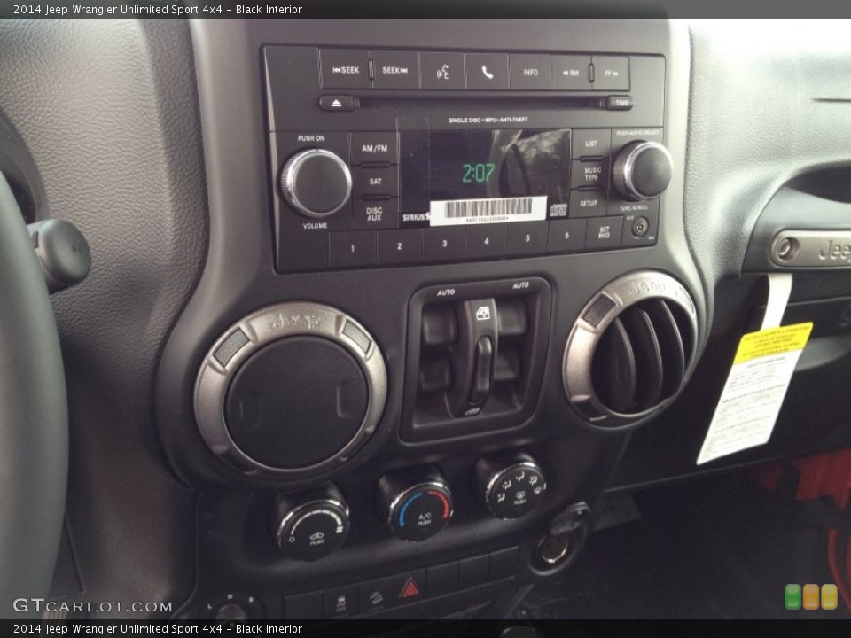 Black Interior Controls for the 2014 Jeep Wrangler Unlimited Sport 4x4 #90552050