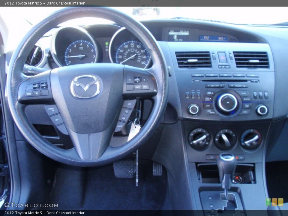 Dark Charcoal Interior Dashboard for the 2012 Toyota Matrix S #90602084
