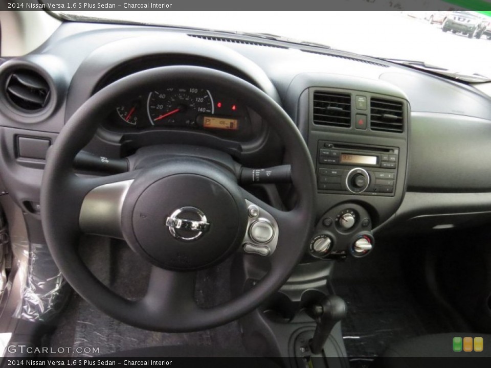 Charcoal Interior Dashboard for the 2014 Nissan Versa 1.6 S Plus Sedan #90661906
